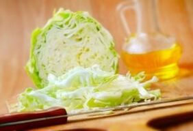 Cabbage is chopped for salad