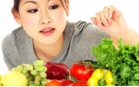Japanese girl chooses a product for a diet